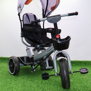 سه چرخه فلزی با سایه بان رنگ طوسی