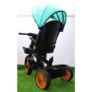 سه چرخه فلزی با سایه بان رنگ فیروزه ای